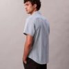 Camicia classica elasticizzata a righe tinte in filo Camicia classica elasticizzata a righe tinte in filo