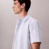 Camicia classica elasticizzata a righe tinte in filo Camicia classica elasticizzata a righe tinte in filo