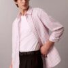 Camicia comoda a righe in cotone con bottoni Camicia comoda a righe in cotone con bottoni