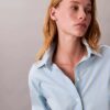 Camicia comoda a righe in cotone con bottoni Camicia comoda a righe in cotone con bottoni