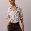 Camicia con bottoni e linguette in lyocell Camicia con bottoni e linguette in lyocell