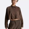 Camicia corta con maniche a pipistrello e bottoni Camicia corta con maniche a pipistrello e bottoni