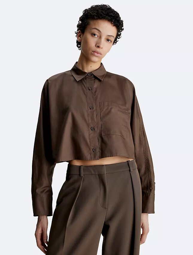 Camicia corta con maniche a pipistrello e bottoni Camicia corta con maniche a pipistrello e bottoni