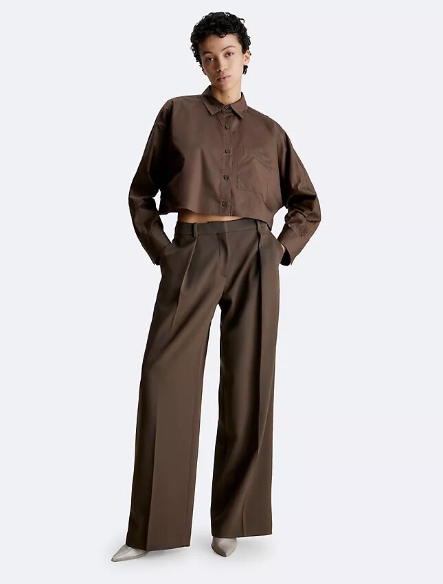 Camicia corta con maniche a pipistrello e bottoni Camicia corta con maniche a pipistrello e bottoni