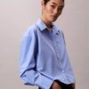 Camicia corta in popeline a quadretti Camicia corta in popeline a quadretti
