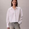 Camicia corta in popeline con bottoni e vestibilità comoda Camicia corta in popeline con bottoni e vestibilità comoda