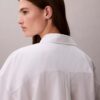 Camicia corta in popeline con bottoni e vestibilità comoda Camicia corta in popeline con bottoni e vestibilità comoda