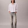 Camicia corta in popeline con bottoni e vestibilità comoda Camicia corta in popeline con bottoni e vestibilità comoda