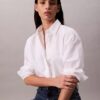 Camicia corta squadrata con bottoni Camicia corta squadrata con bottoni