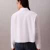 Camicia corta squadrata con bottoni Camicia corta squadrata con bottoni