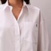 Camicia corta squadrata in popeline di cotone con bottoni Camicia corta squadrata in popeline di cotone con bottoni