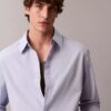 Camicia in cotone tinta unita dal taglio morbido con colletto button-down Camicia in cotone tinta unita dal taglio morbido con colletto button-down