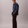 Camicia oversize in Denim con Monogram su tutta la superficie in stile anni ’90 Camicia oversize in Denim con Monogram su tutta la superficie in stile anni ’90