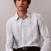 Camicia slim in Supima elasticizzato a righe tinte in filo Camicia slim in Supima elasticizzato a righe tinte in filo