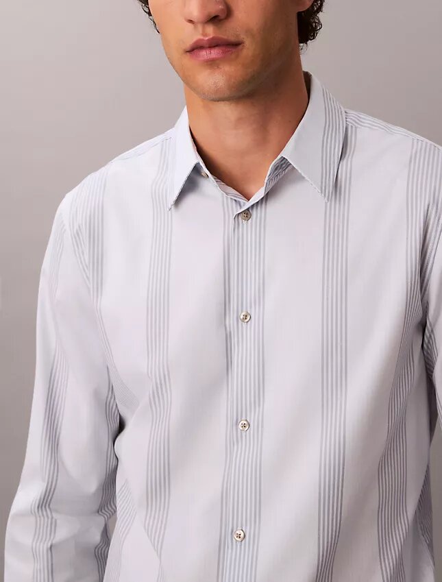 Camicia slim in Supima elasticizzato a righe tinte in filo Camicia slim in Supima elasticizzato a righe tinte in filo
