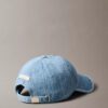 Cappellino da baseball con logo emblema su tutta la superficie in Denim