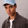 Cappellino da baseball con logo emblema su tutta la superficie in Denim
