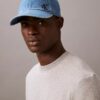 Cappellino da baseball in Denim lavato con logo ricamato Cappellino da baseball in Denim lavato con logo ricamato