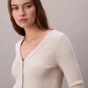Cardigan corto a costine