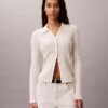 Cardigan polo in cotone a costine liscio Cardigan polo in cotone a costine liscio