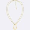 Collana con pendente dalla forma rotonda e organica Collana con pendente dalla forma rotonda e organica