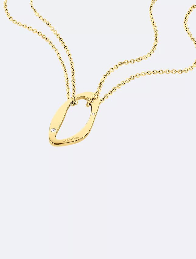 Collana con pendente dalla forma rotonda e organica Collana con pendente dalla forma rotonda e organica