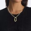 Collana con pendente dalla forma rotonda e organica Collana con pendente dalla forma rotonda e organica