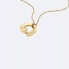 Collana con pendente rotondo scultoreo Collana con pendente rotondo scultoreo