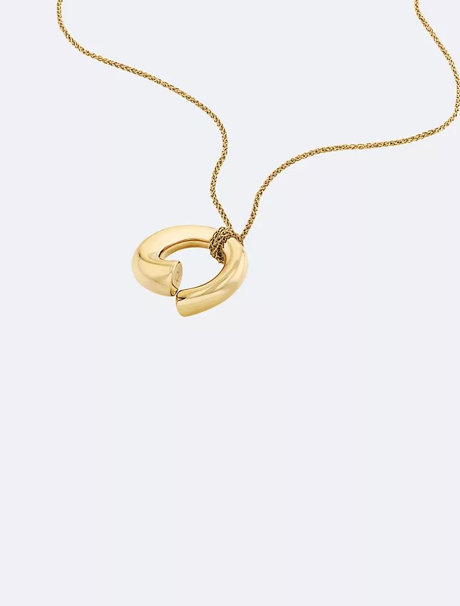 Collana con pendente rotondo scultoreo Collana con pendente rotondo scultoreo