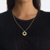 Collana con pendente rotondo scultoreo Collana con pendente rotondo scultoreo