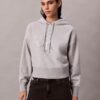 Felpa con cappuccio morbida in pile con Monogram in paillettes Felpa con cappuccio morbida in pile con Monogram in paillettes