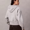 Felpa con cappuccio morbida in pile con Monogram in paillettes Felpa con cappuccio morbida in pile con Monogram in paillettes