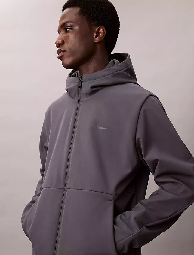 Giacca softshell con cappuccio e zip Giacca softshell con cappuccio e zip