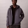 Giacca softshell con cappuccio e zip Giacca softshell con cappuccio e zip