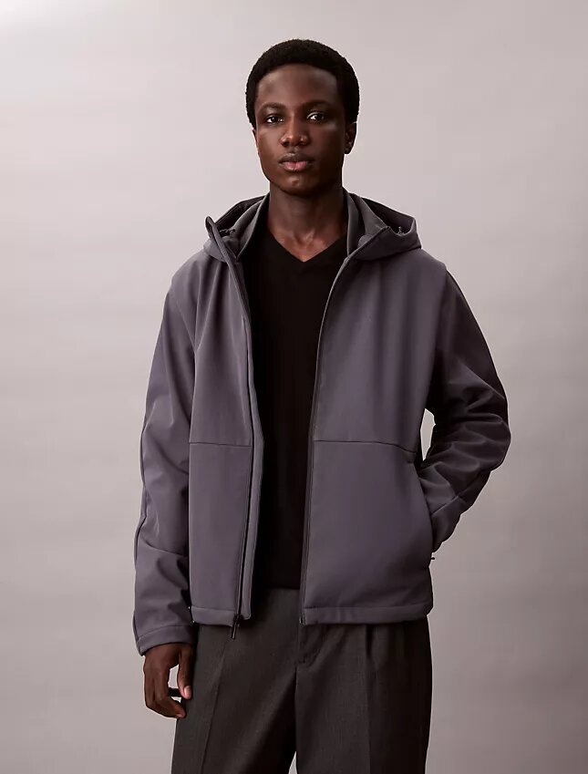 Giacca softshell con cappuccio e zip Giacca softshell con cappuccio e zip