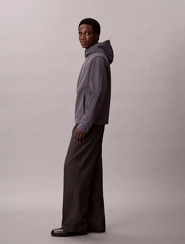 Giacca softshell con cappuccio e zip Giacca softshell con cappuccio e zip