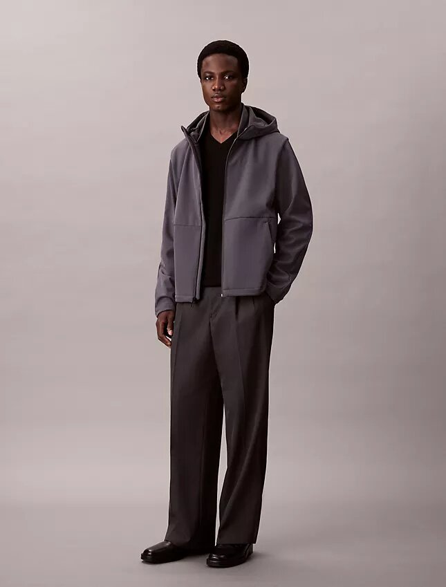 Giacca softshell con cappuccio e zip Giacca softshell con cappuccio e zip