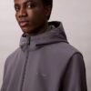 Giacca softshell con cappuccio e zip Giacca softshell con cappuccio e zip