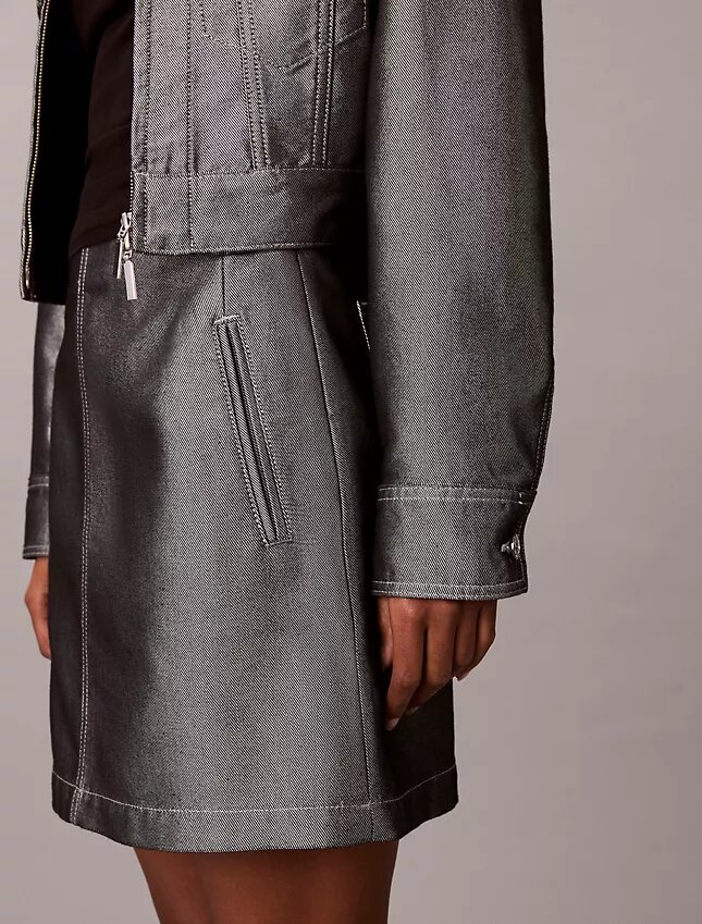 Gonna svasata in denim lucido Gonna svasata in denim lucido