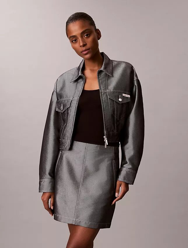 Gonna svasata in denim lucido Gonna svasata in denim lucido