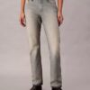 Jeans bootcut morbidi con cimosa