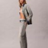 Jeans bootcut morbidi con cimosa
