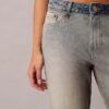 Jeans bootcut morbidi con cimosa