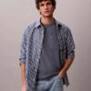 Maglietta comoda con tasca in jersey di cotone Maglietta comoda con tasca in jersey di cotone