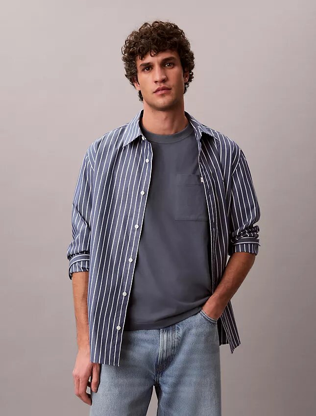 Maglietta comoda con tasca in jersey di cotone Maglietta comoda con tasca in jersey di cotone
