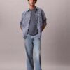 Maglietta comoda con tasca in jersey di cotone Maglietta comoda con tasca in jersey di cotone