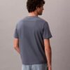 Maglietta comoda con tasca in jersey di cotone Maglietta comoda con tasca in jersey di cotone