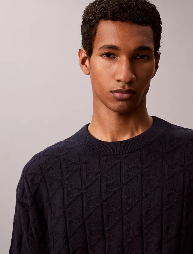 Maglione a coste con logo su tutta la superficie Maglione a coste con logo su tutta la superficie
