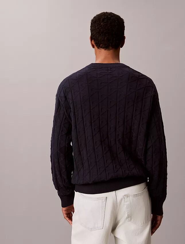 Maglione a coste con logo su tutta la superficie Maglione a coste con logo su tutta la superficie