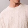 Maglione a costine con logo su tutta la superficie